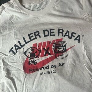 Nike White T-Shirt with Red Swoosh and Black Graphics